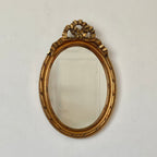 Miroir doré en bois