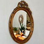 Miroir doré en bois