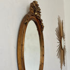 Miroir doré en bois
