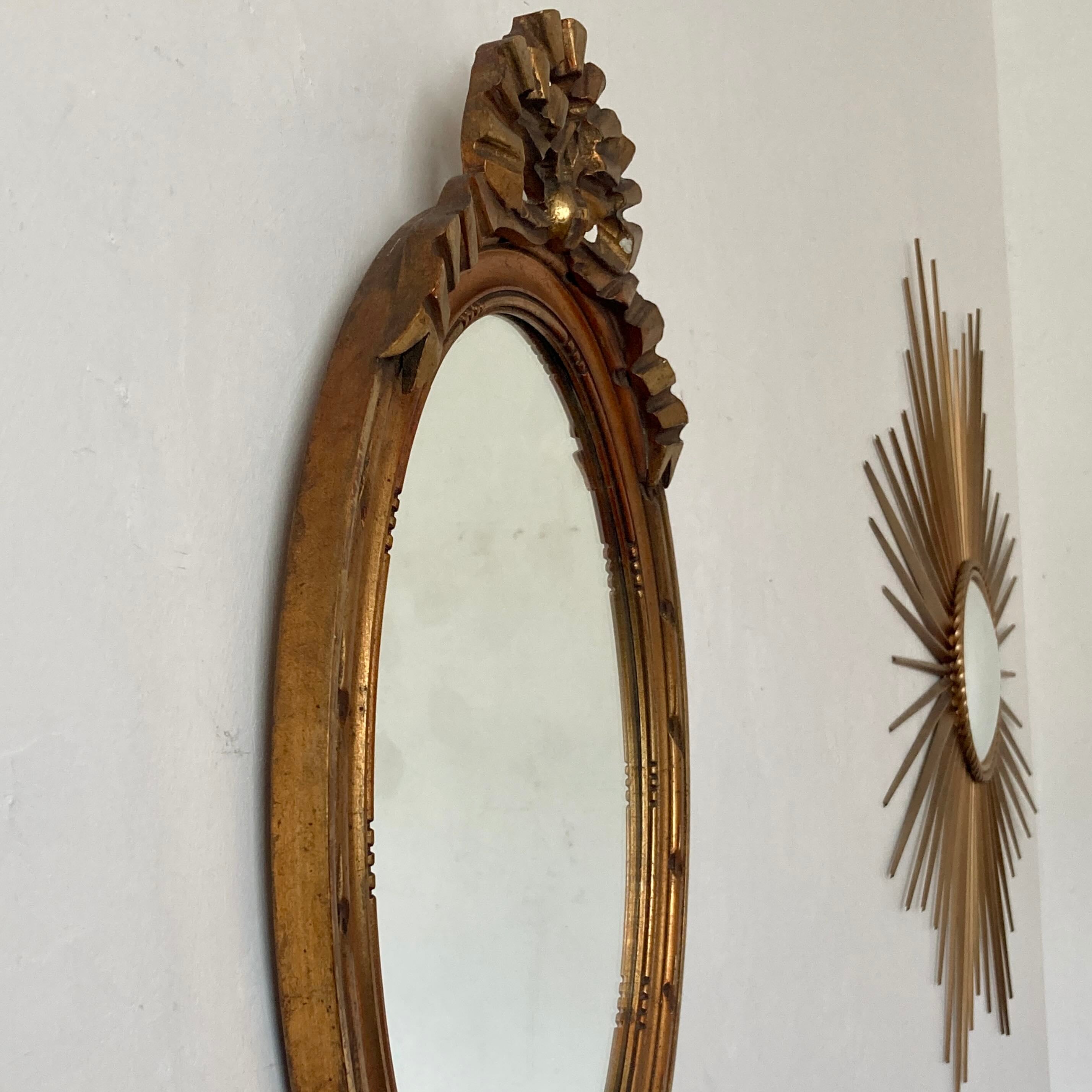 Miroir doré en bois