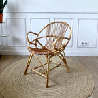 Fauteuil "coquille" en rotin