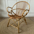 Fauteuil "coquille" en rotin