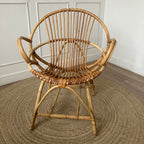 Fauteuil "coquille" en rotin