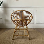 Fauteuil "coquille" en rotin