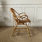 Fauteuil "coquille" en rotin