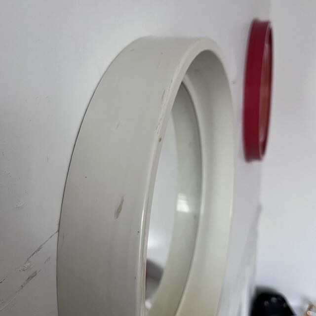 Miroir rond en plastique blanc 70's