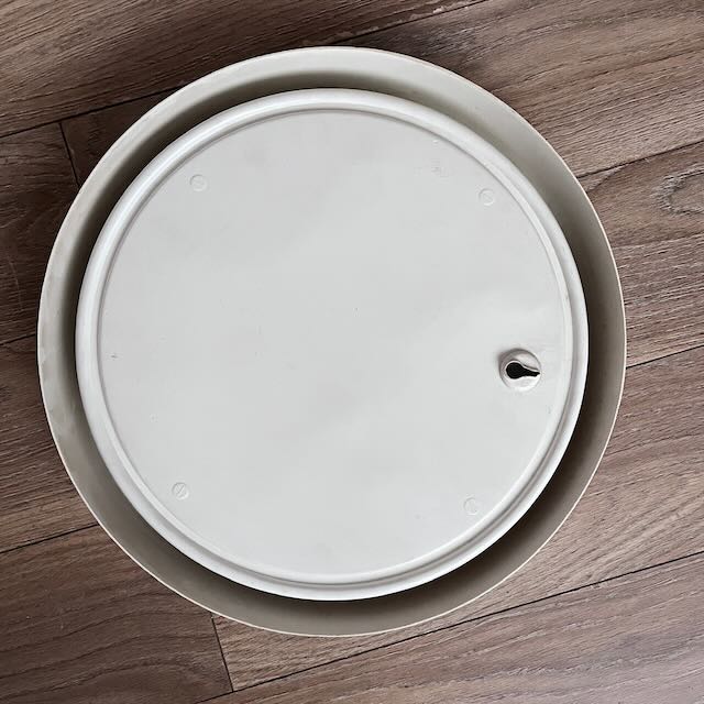 Miroir rond en plastique blanc 70's