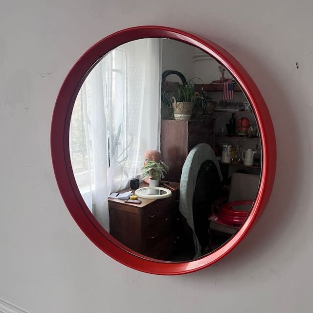 Miroir vintage rond en plastique orange