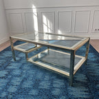Table basse dorée à plateaux de verre