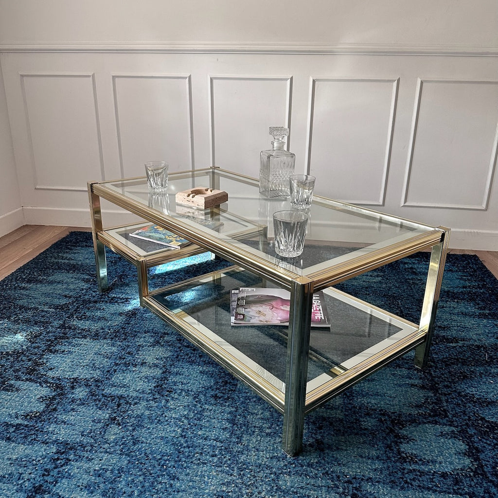 Table basse dorée à plateaux de verre