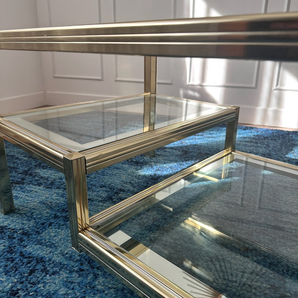 Table basse dorée à plateaux de verre