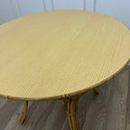 Table à manger ronde en rotin vintage